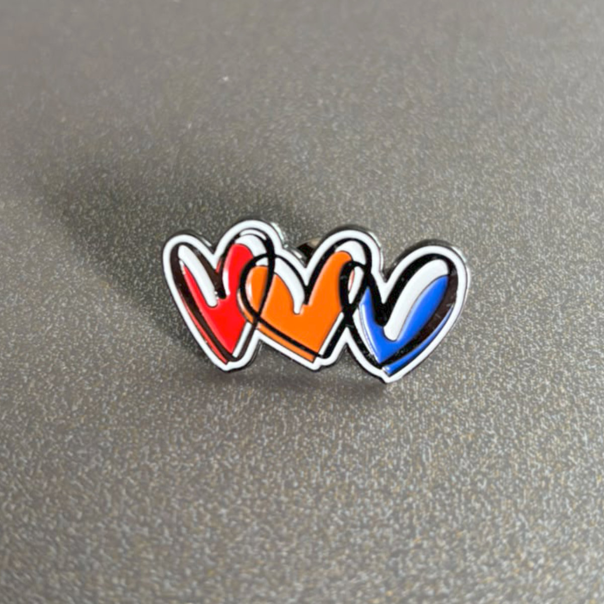 The iconic Love hearts pin badge